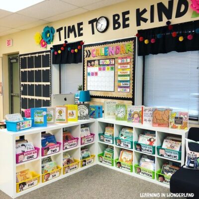 Kindergarten classroom with color coded cubbies and a sign that reads time to be kind using the clock in the word "to."