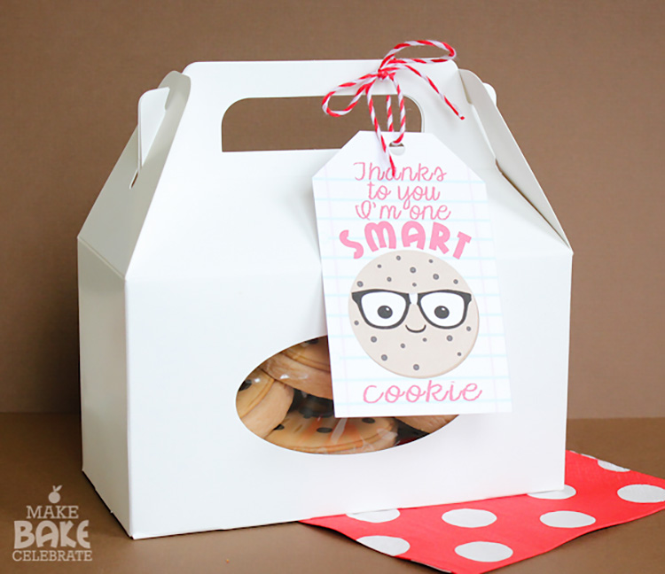 box of cookies with gift tag that says thanks to you i'm one smart cookie 