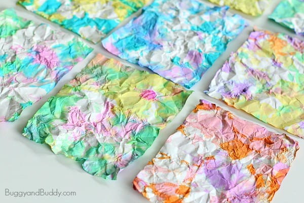 Colorful pieces of crumpled paper are made into art.