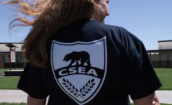 woman wearing a california school employees association shirt 