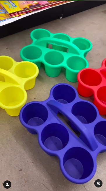 Four colorful six cup caddies as an example of dollar store hacks for the classroom 