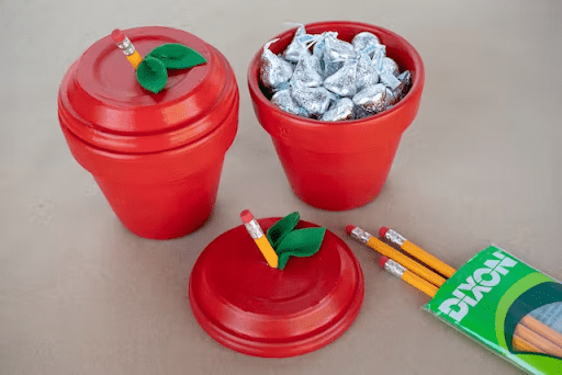 Terracotta cups with hershey kisses in them