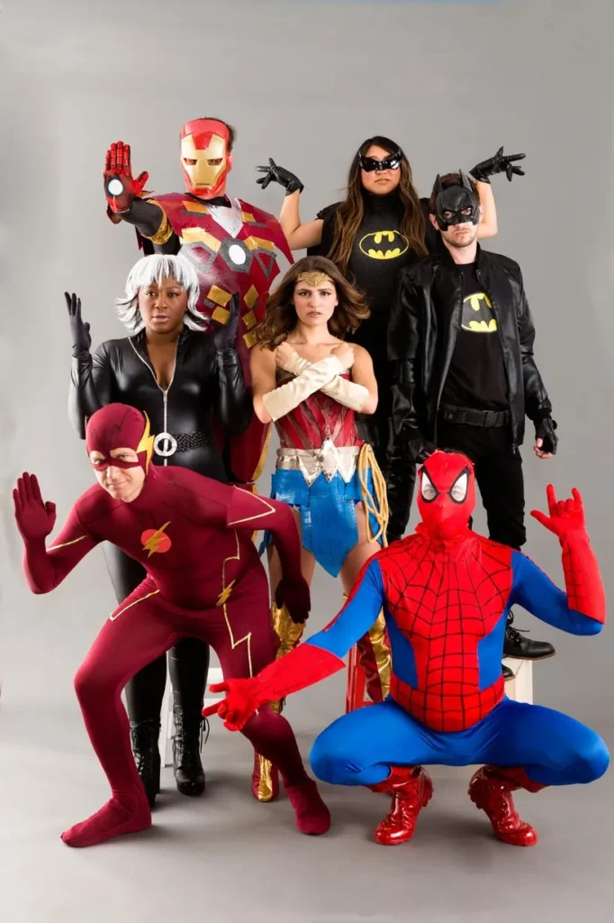 Teacher Halloween costumes include a large group of people dressed as superheroes.