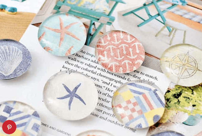 Clear glass magnets with children's drawing decoupaged to the backs
