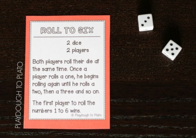 Rules for Roll to Six dice game printed on a card, with two dice (Dice Games)
