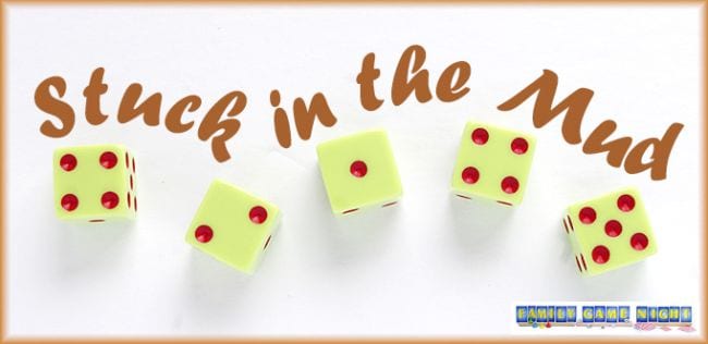 Five yellow dice with red spots; text reads Stuck in the Mud