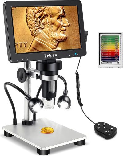 Digital microscope with a large LCD display screen, focused on an American penny