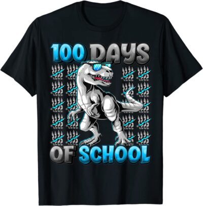 A black shirt has a t-rex on it wearing sunglasses. Text reads 100 days of school. There are crayons in groups of 5 in the background that equal 100.