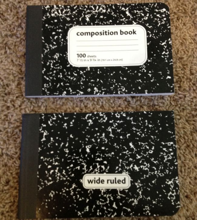 Composition notebook cut in half horizontally to create two notebooks as an example of dollar store hacks for the classroom 