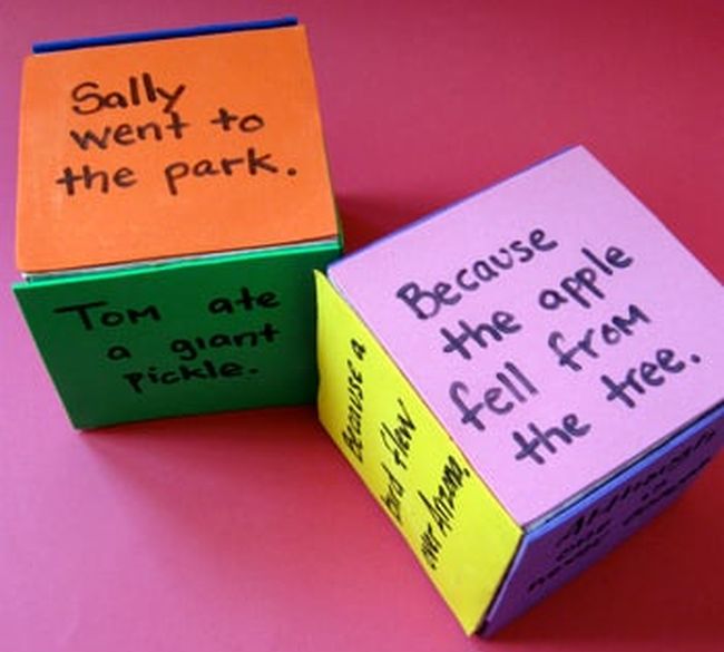 Dry erase dice with various sentences written on each side