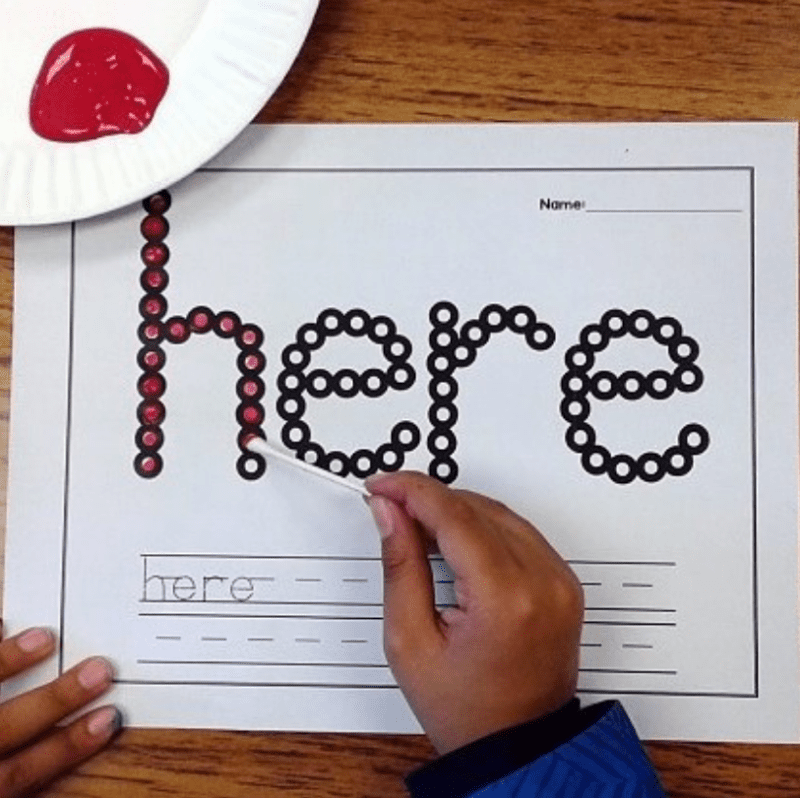 dot paint words with a cotton swab