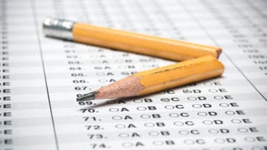 Standardized test with broken pencil (College Board drops SAT essay and subject tests)