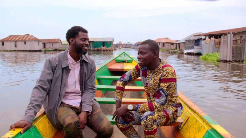 Two men in a colorful boat, from the Netflix show High on the Hog