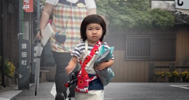 Japanese toddler running an errand in the Netflix show Old Enough