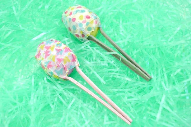 plastic egg activity with chopsticks to make maracas 