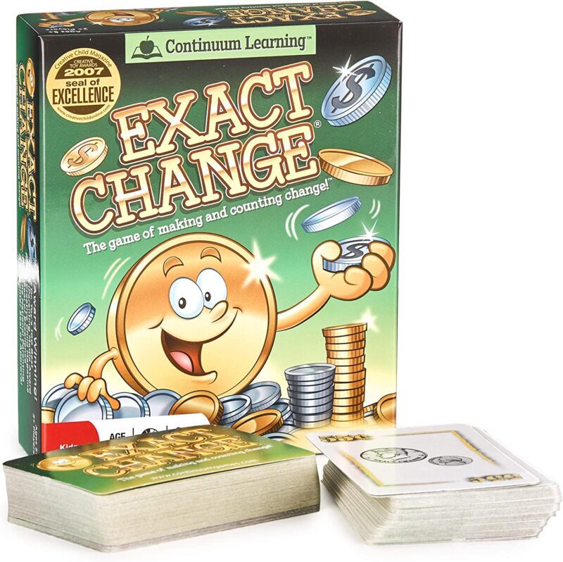 A game box says exact change and has a cartoon coin standing in front of stacks of money. (math board games)