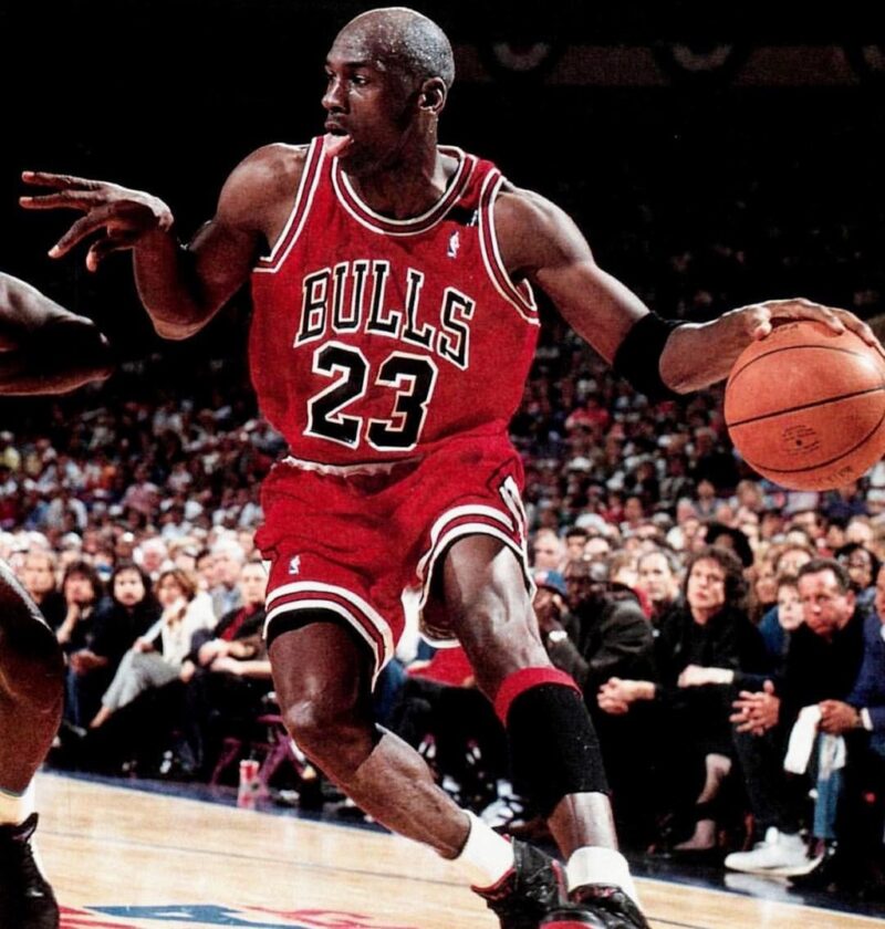 Michael Jordan in Chicago Bulls uniform playing basketball