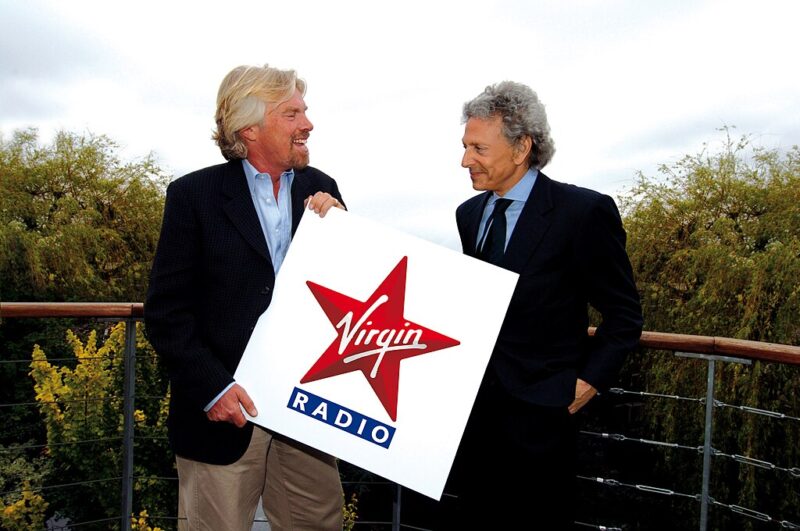 Richard Branson with Virgin Radio sign