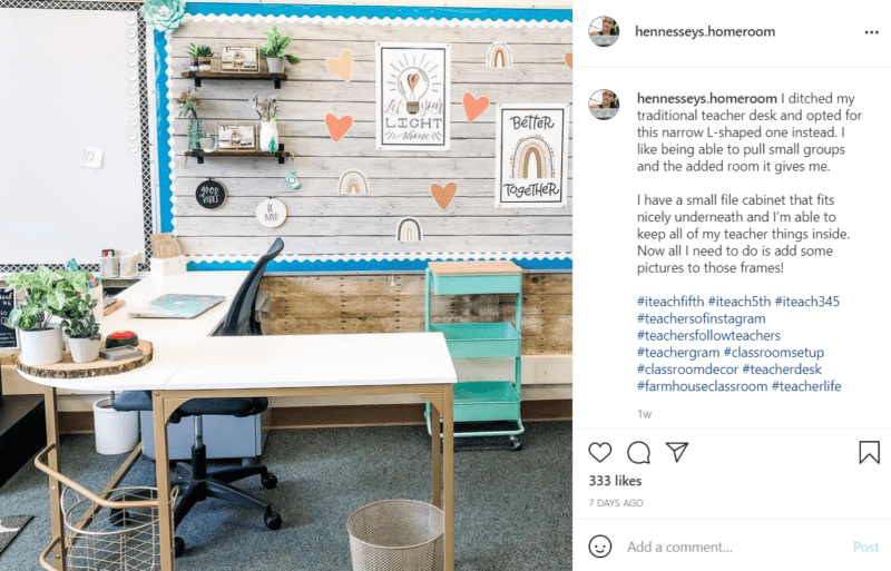 Light, pleasant colors are used in farmhouse classroom décor setting while a low profile corner desk with minimal shelving is displayed to indicate the teacher's openness to students.