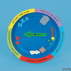 A paper plate is painted blue. It has an arrow in the middle that can be spun to point to different chores. 