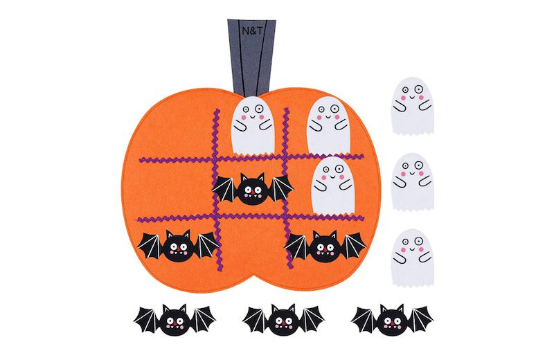 Felt pumpkin with tic tac toe game using ghosts and bats, as an example of classroom decor for Halloween