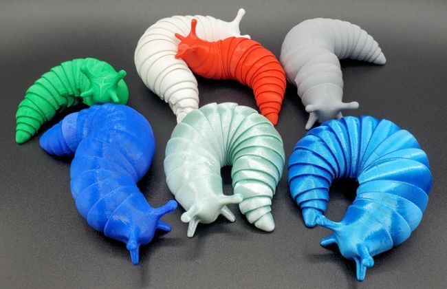 Fidgets for kids: Colorful plastic slugs with flexible segmented bodies