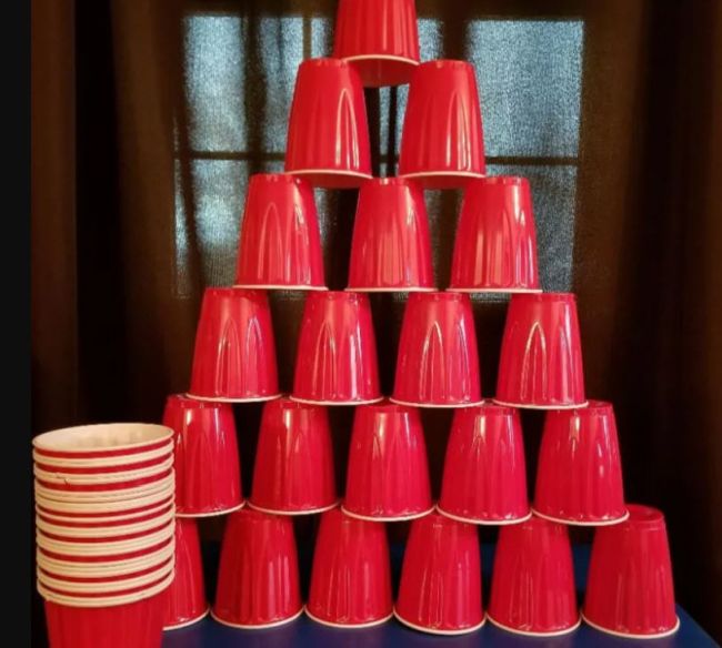 Pyramid of red plastic Solo drinking cups