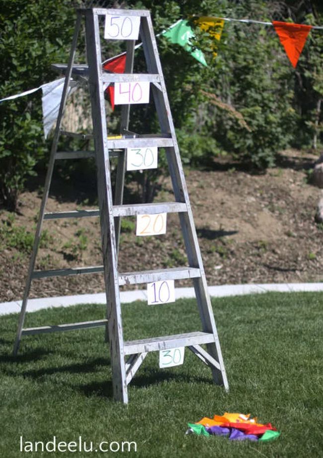 Ladder labeled with points, and a pile of colorful bean bags 