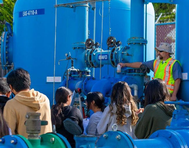 Middle school students on a field trip to a water reclamation facility