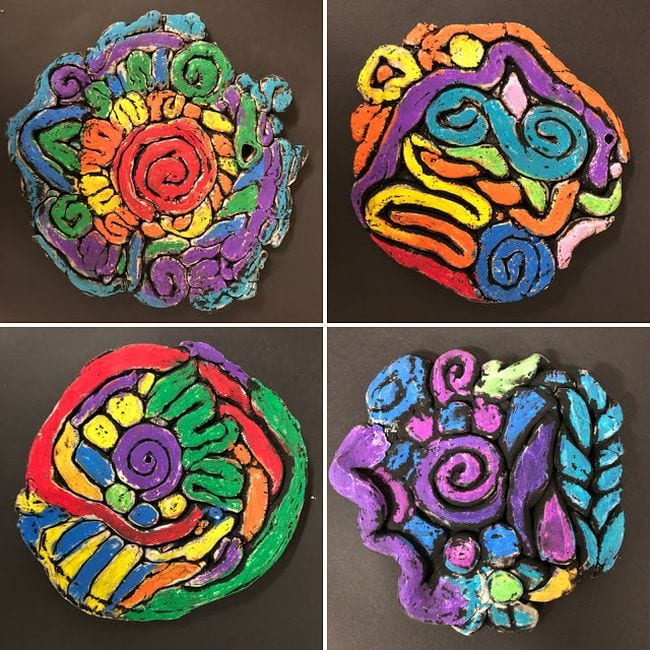 Clay art pieces sculpted from coils in bright colors (Fifth Grade Art)