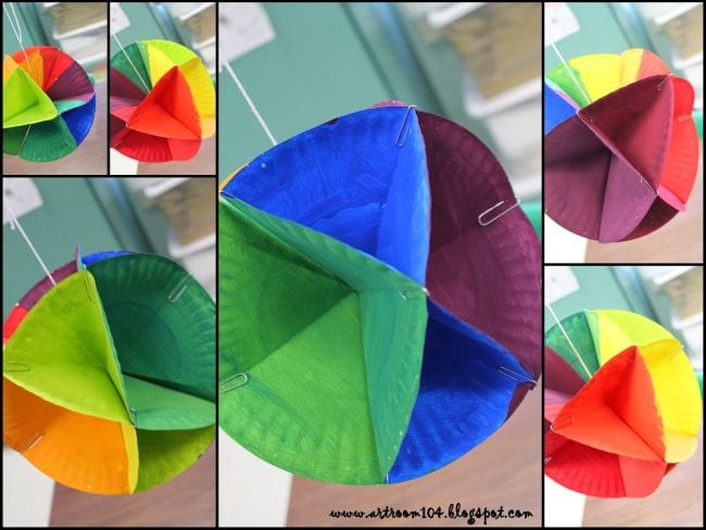 Collage of paper plates colored, folded, and glued to make 3D balls (Fifth Grade Art Projects)