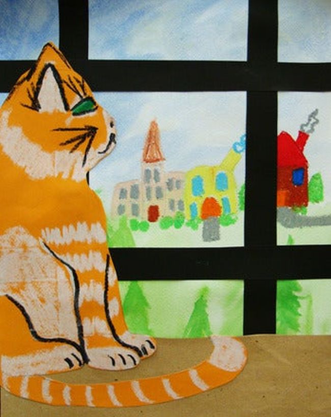 Paper cat looking out a window at a castle and other items (Fifth Grade Art)