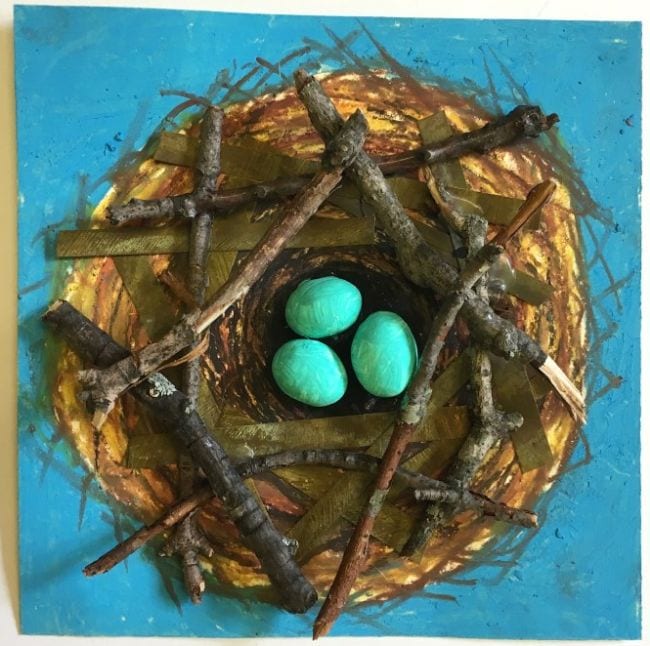 Bird nest painted on paper, accented with twigs and clay eggs (Fifth Grade Art)