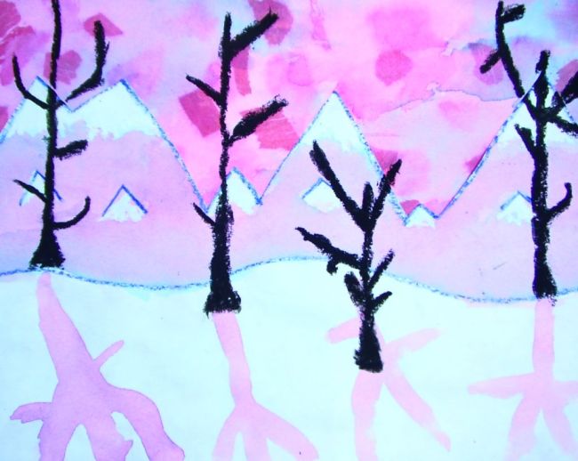 Pastel colored mountain range with bare trees, created with watercolor resist method (Fifth Grade Art)