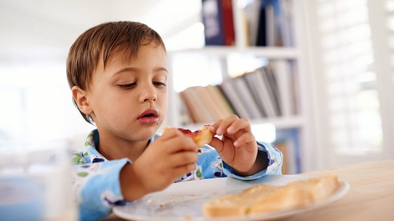 Child Eating Toast
