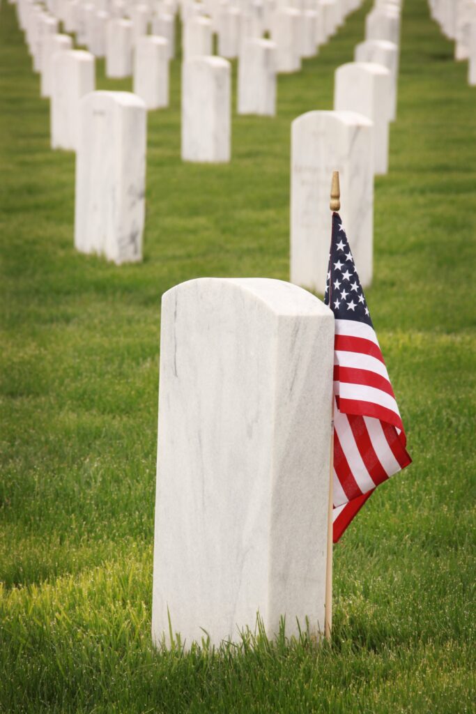 tombstone and flag for veterans vs memorial day
