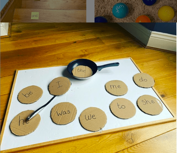 Sight words on cardboard circles that resemble pancakes with a small frying pan and spatula arranged on a white work surface 