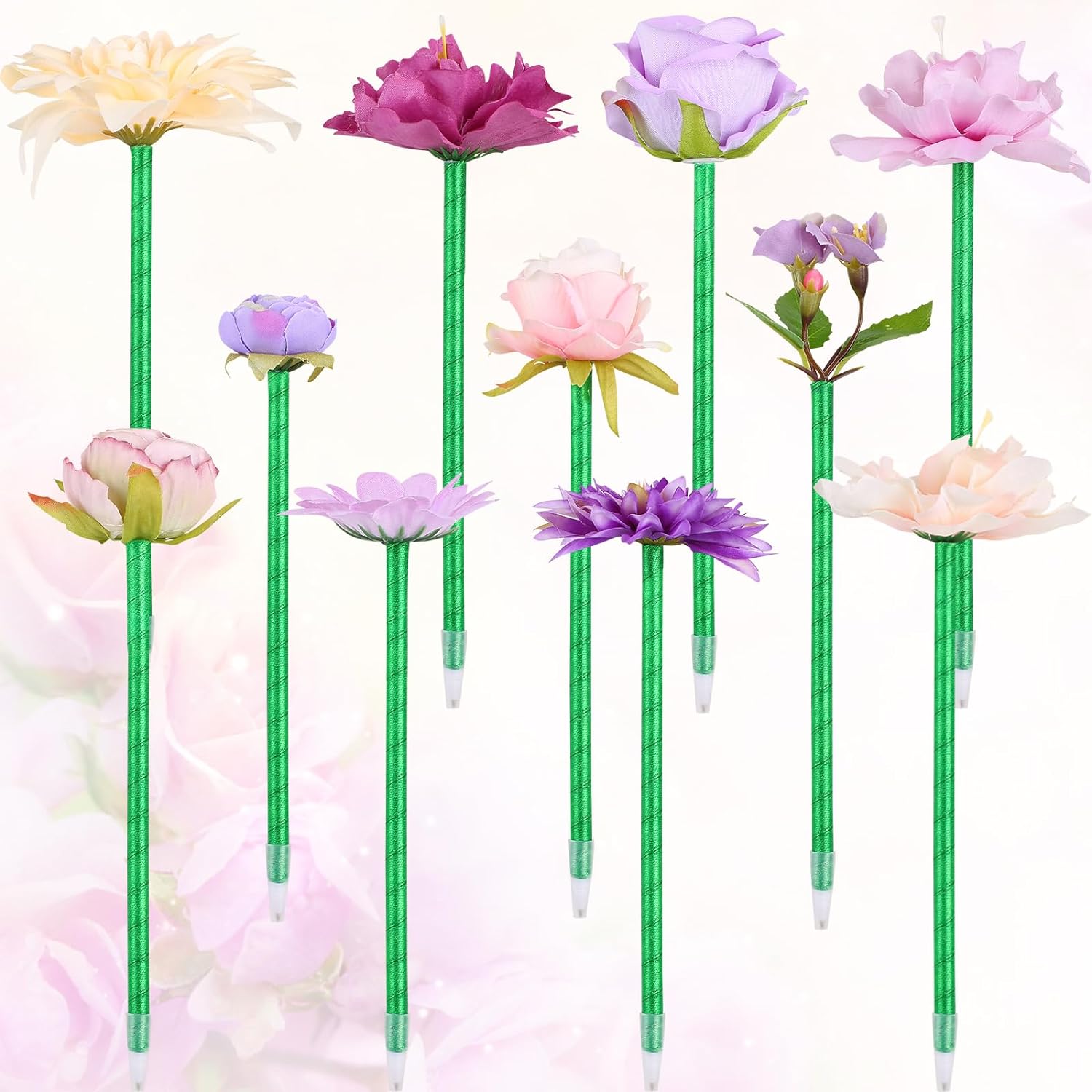 A set of pens with artificial flowers attached to the ends