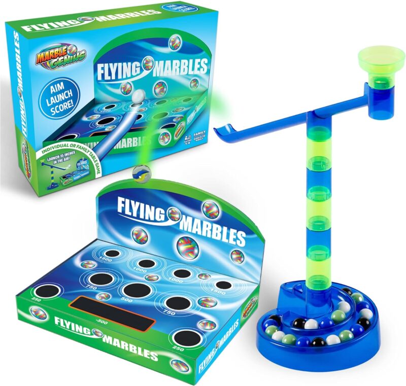 A blue and green scale is seen holding marbles. A box says Flying Marbles