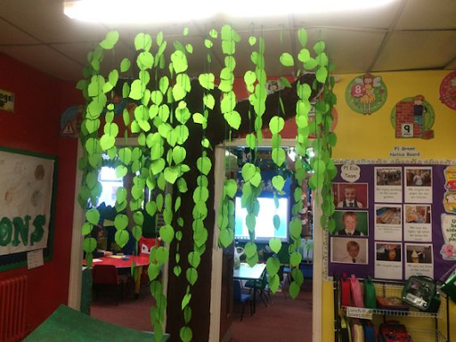 Classroom with vines hanging from the ceiling