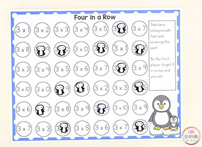 game board with math problems and penguin pictures covering some problems for a math fact game 