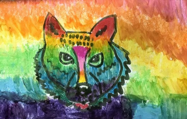 Boldly drawn tiger head with a rainbow background (Fourth Grade Art Projects)