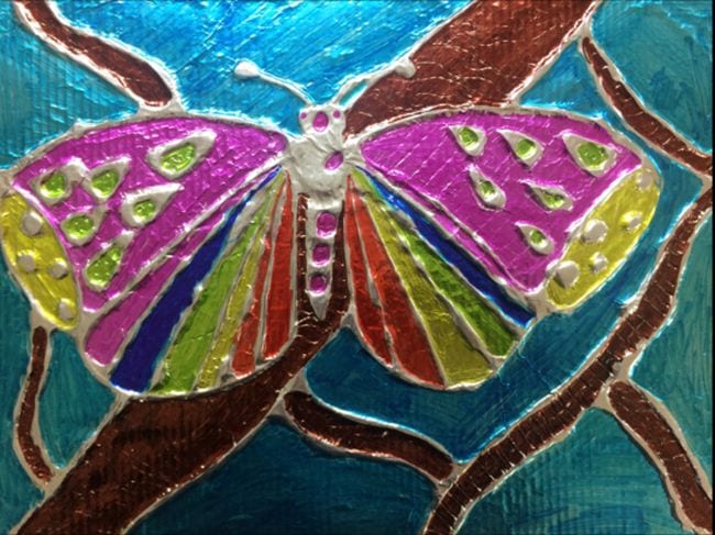 Butterfly made with glue lines on foil, colored in with markers 