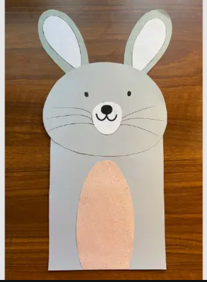 Make bunny paper bag puppets