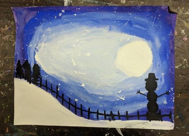 Painted nighttime winter scene with full moon and snowman and tree silhouettes (Fourth Grade Art)