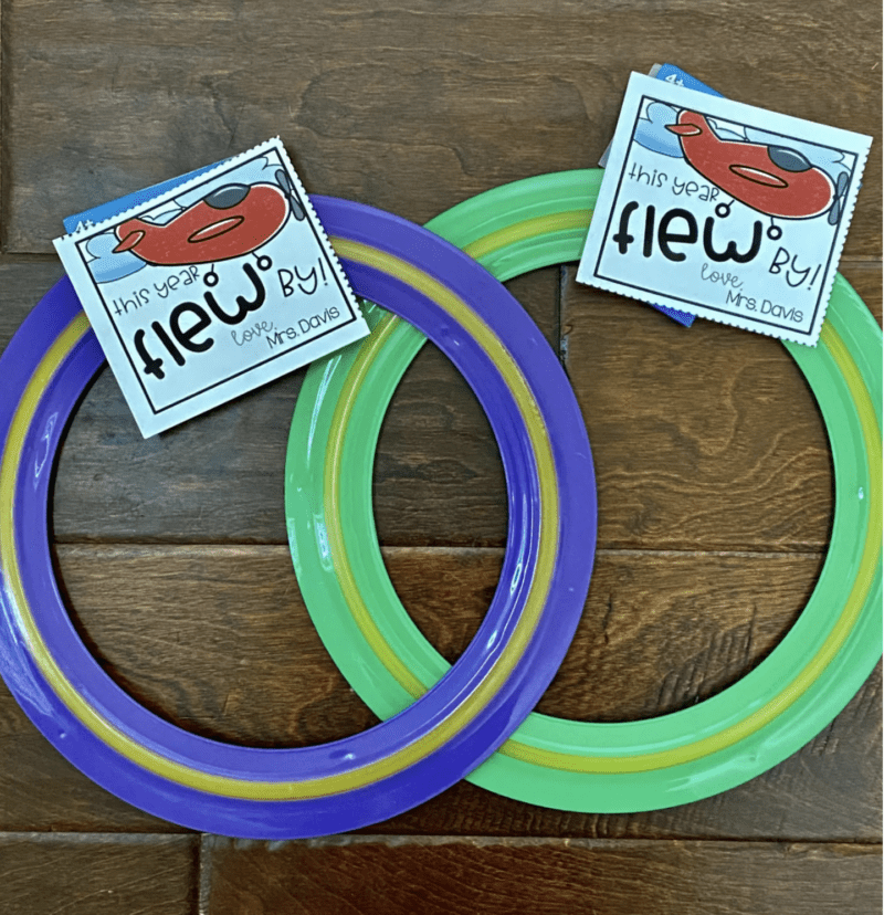 Frisbee rings with a gift tag attached
