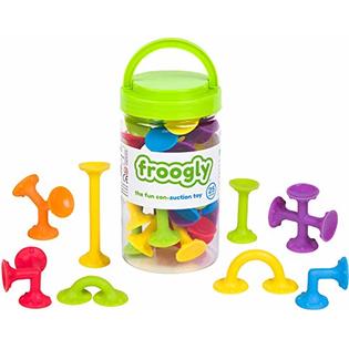A jar contains rubbery looking pieces with suction cup bottoms in different shapes.