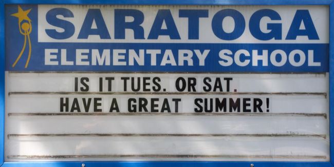 School marquee reading Is it Tues or Sat: Have a Great Summer!"