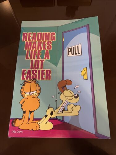 A poster with Garfield promoting reading