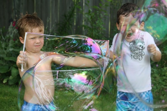 photo-of-kids-making-bubbles 